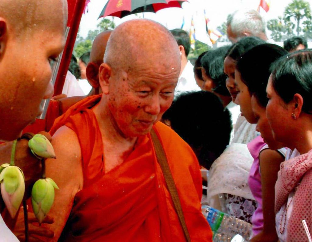 Maha Ghosananda in a historic moment, his presence commanding respect and radiating peace