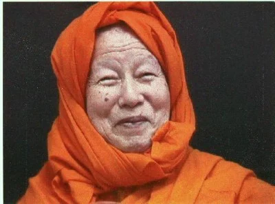 Maha Ghosananda smiling warmly, radiating the compassion and joy that defined his spiritual presence